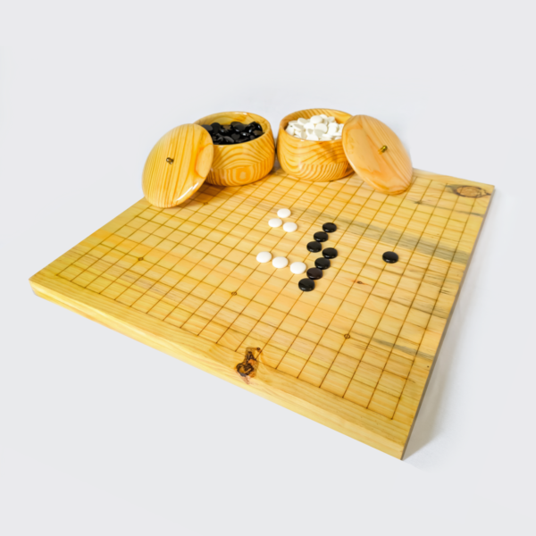 Handmade natural pine wood Go game board with stones