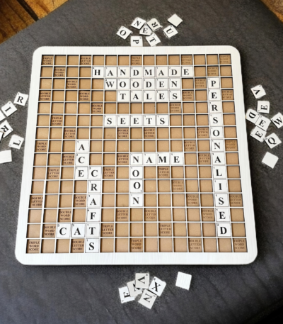 Handmade 18-inch wooden Scrabble board game with 128 MDF wood tiles on a rustic table, perfect for family game nights or home decor.